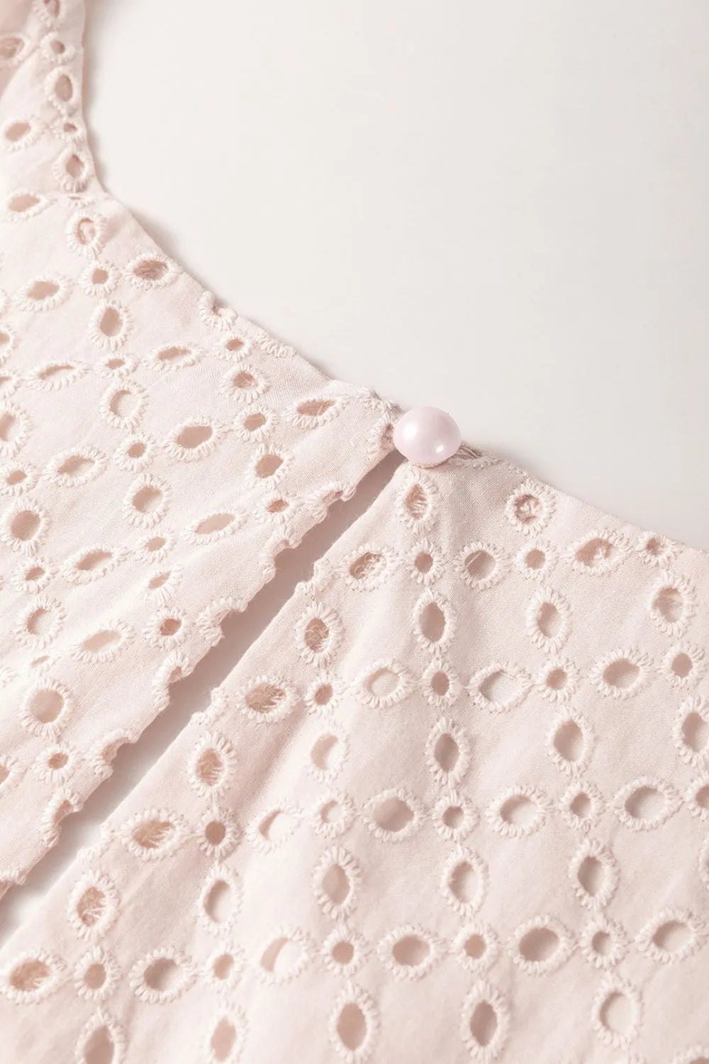 Embroidered Eyelets Ruffled Hem Sleeveless Mini Dress