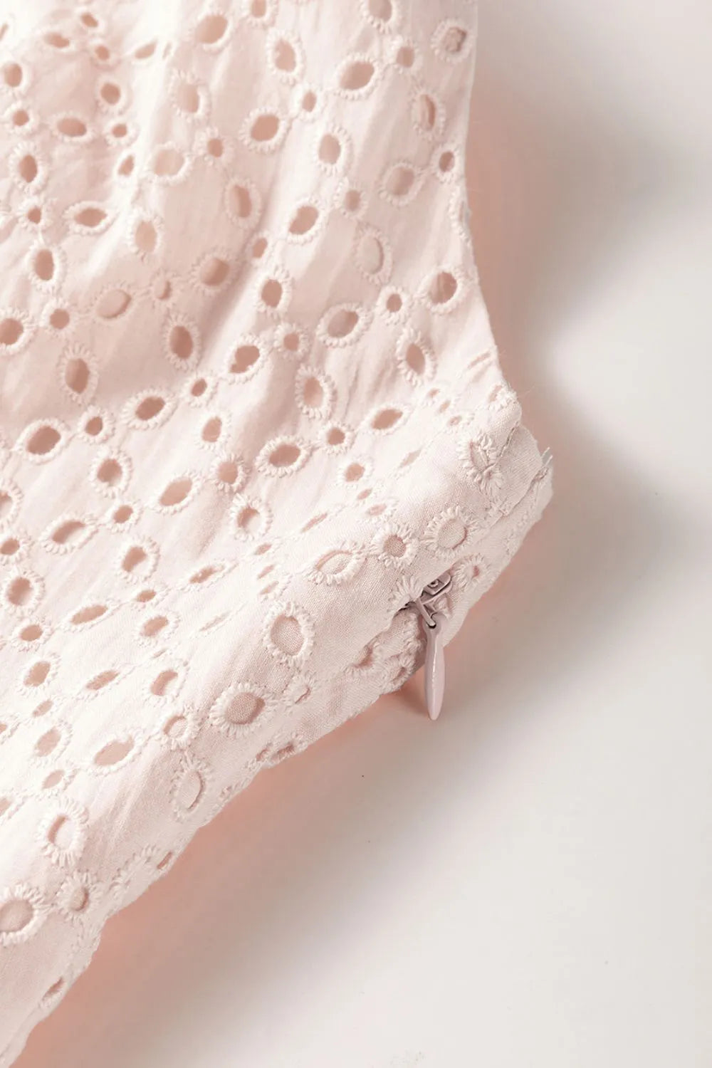 Embroidered Eyelets Ruffled Hem Sleeveless Mini Dress