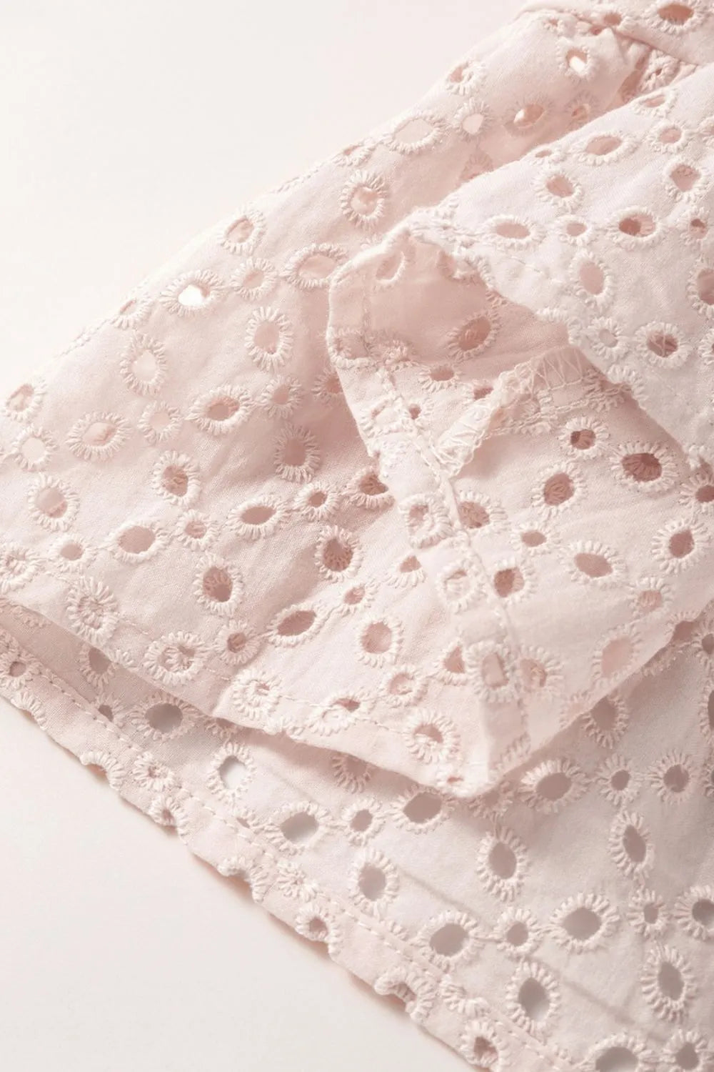 Embroidered Eyelets Ruffled Hem Sleeveless Mini Dress